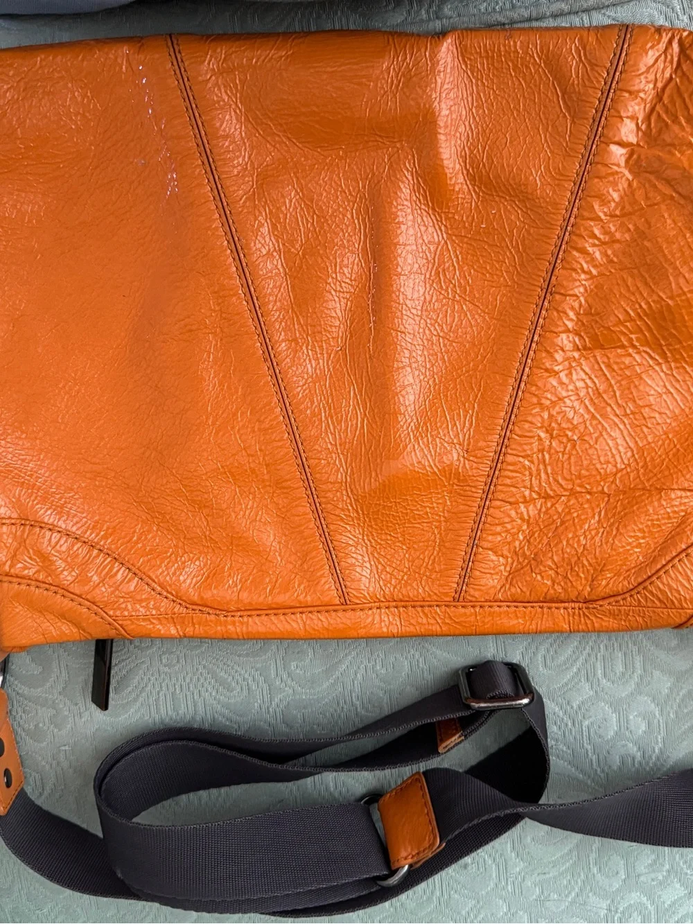 Bright orange HOBO bag